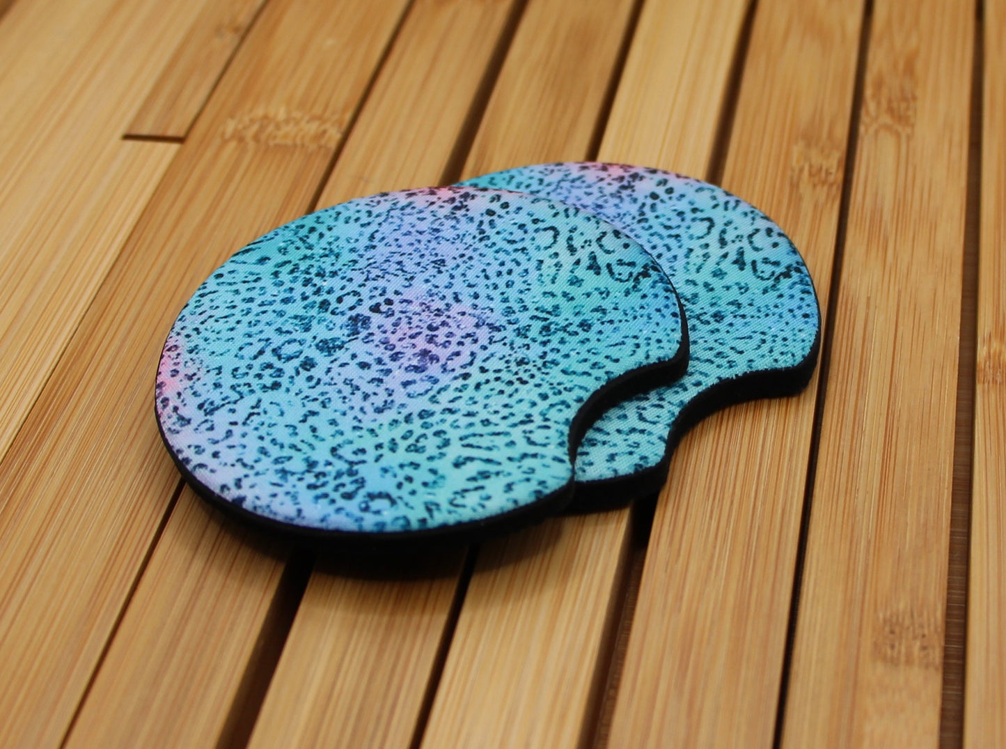 Durable neoprene car coasters with teal jaguar design