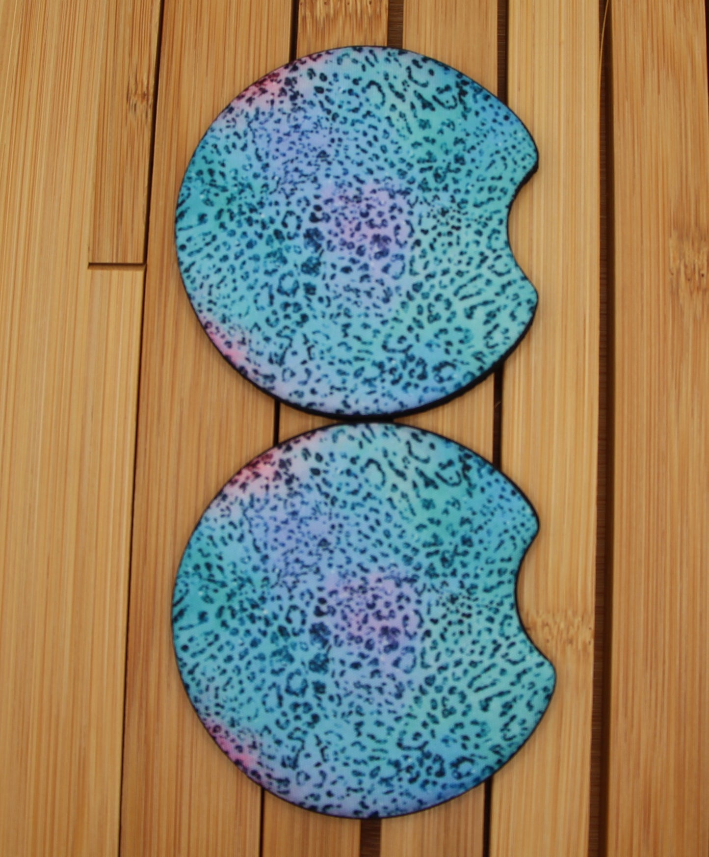 Stylish jaguar print car coasters in teal