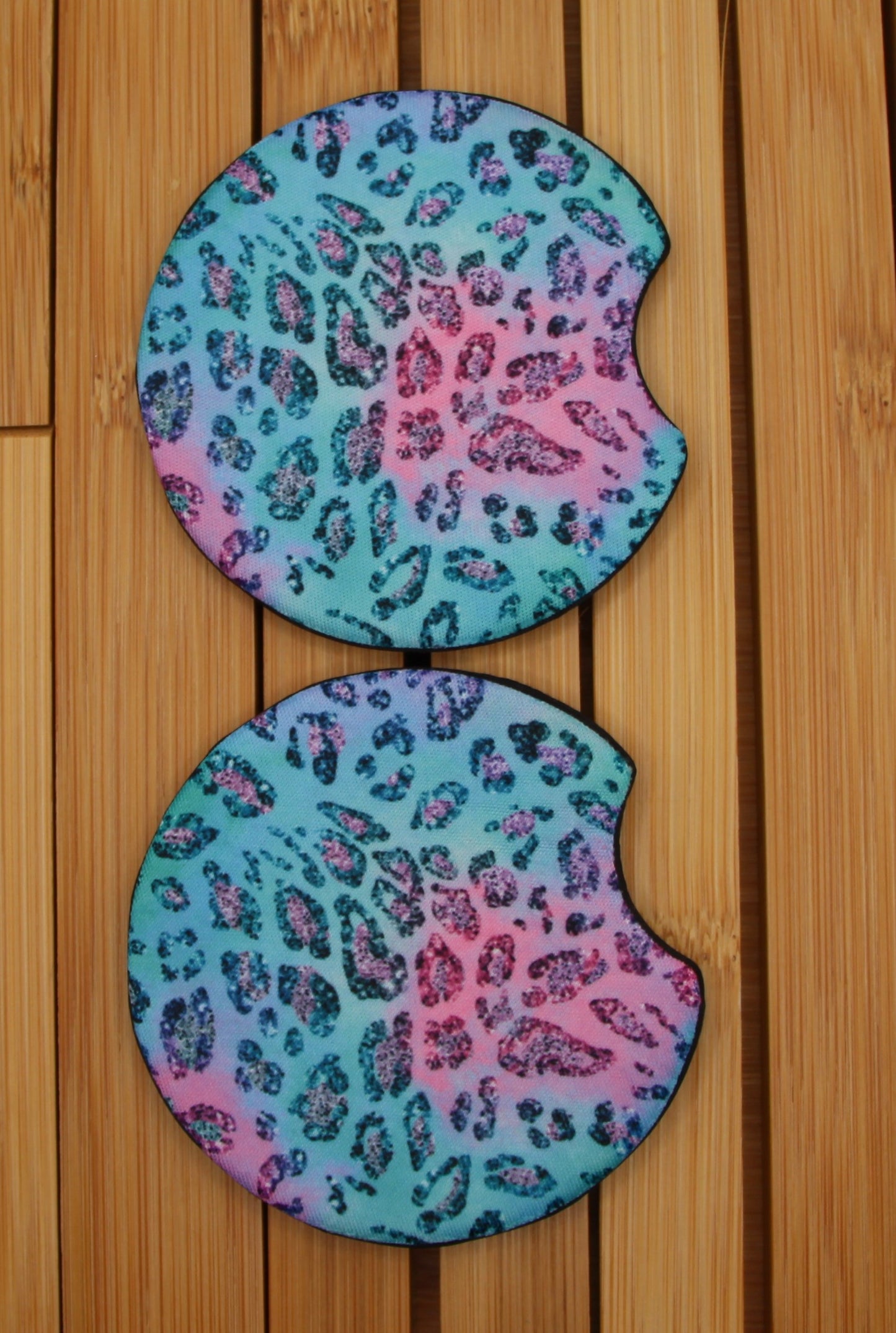 Stylish leopard print car coasters in pink and teal