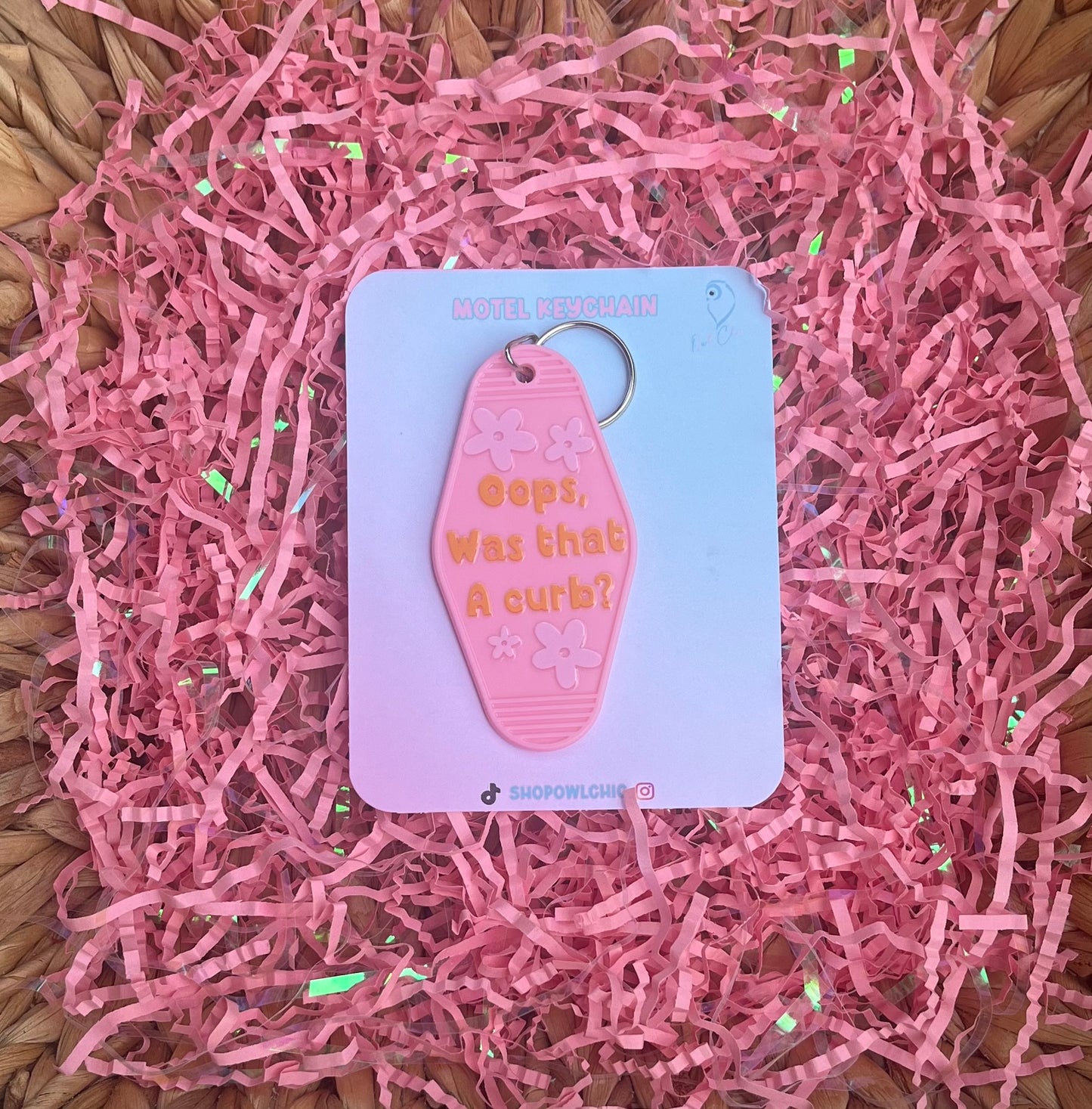 Oops, Was That a Curb? motel keychain in pink