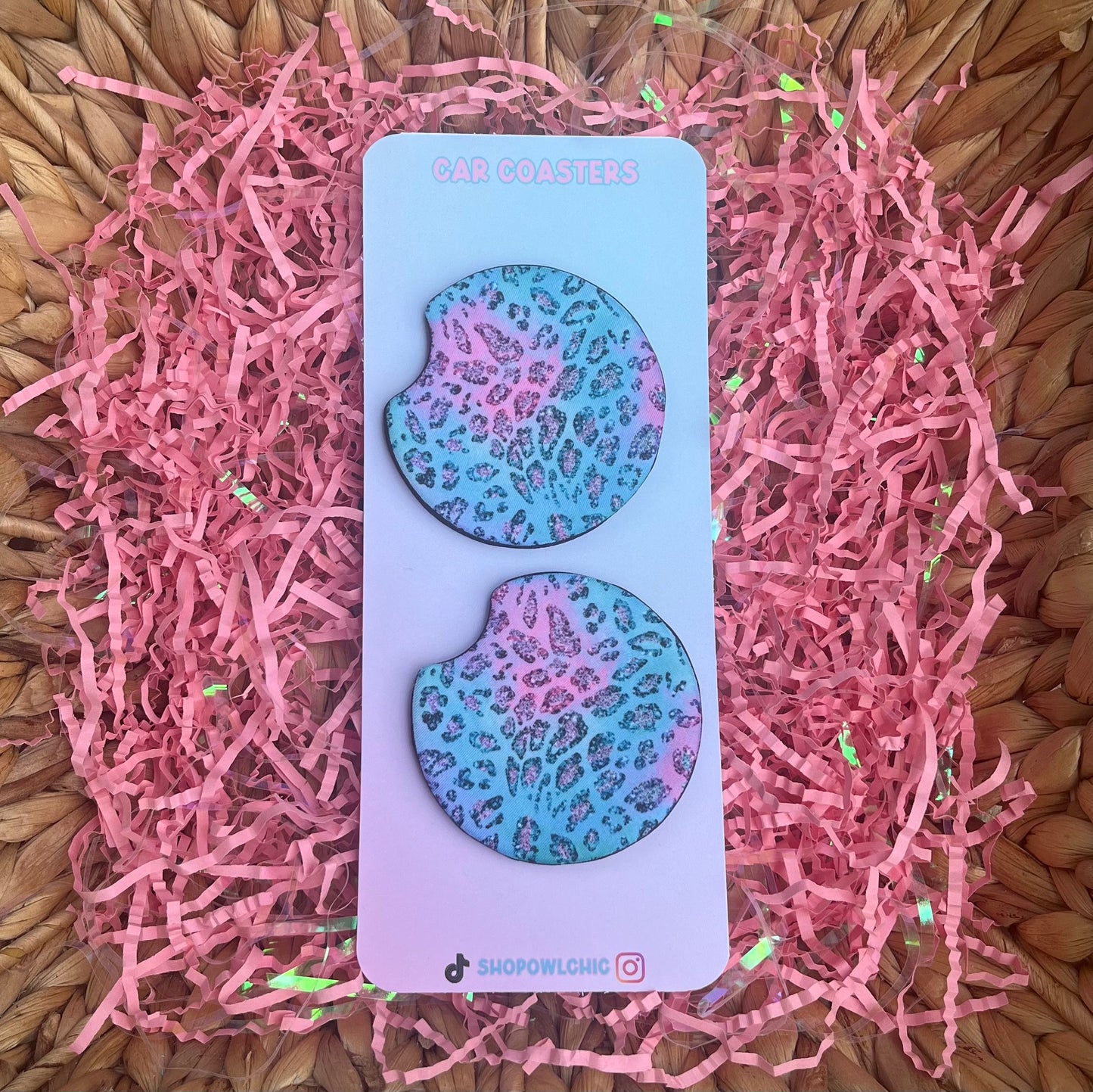 Pink and teal leopard print car coasters made from neoprene