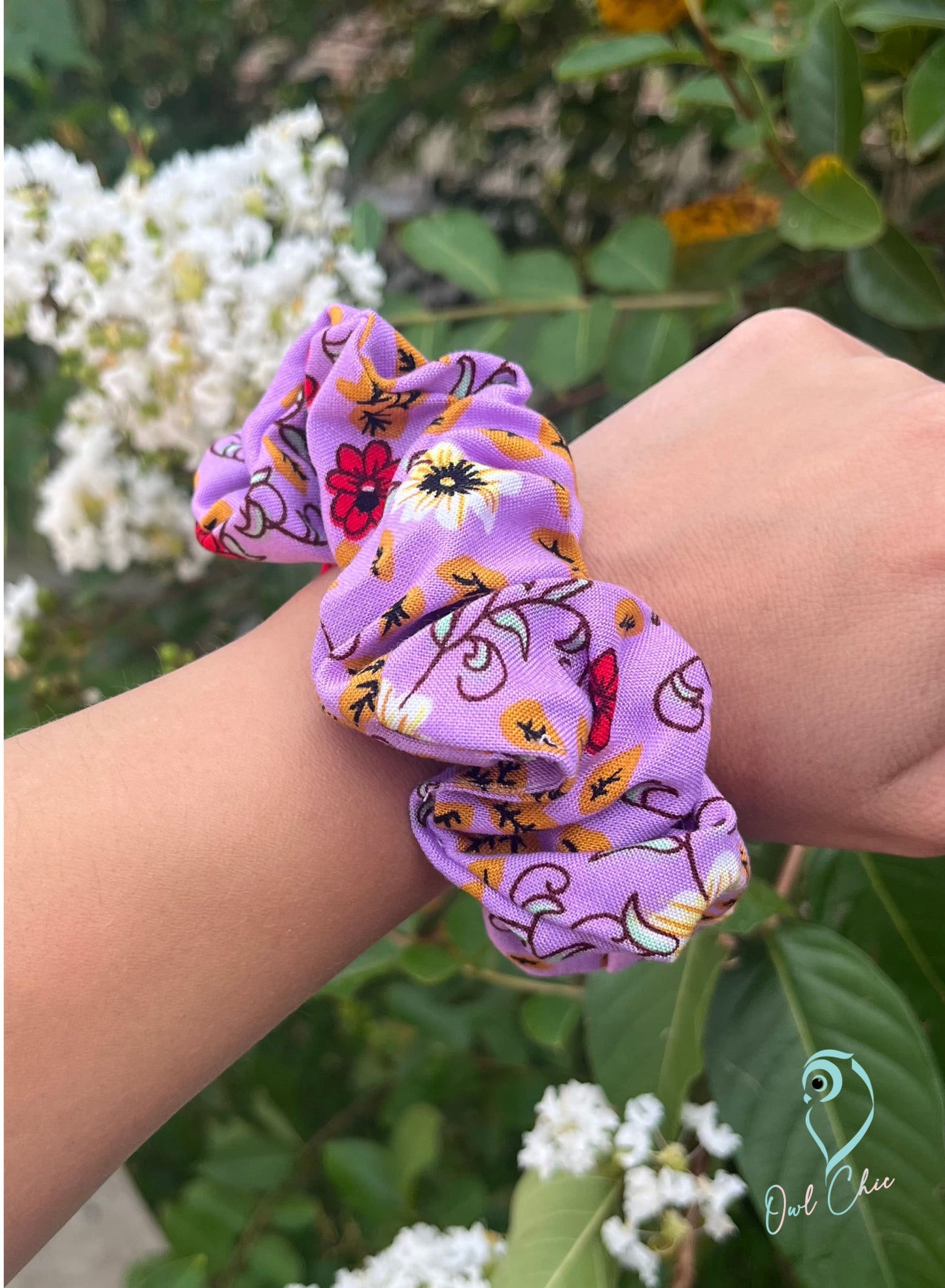 Handmade lavender rayon challis scrunchie in floral pattern.