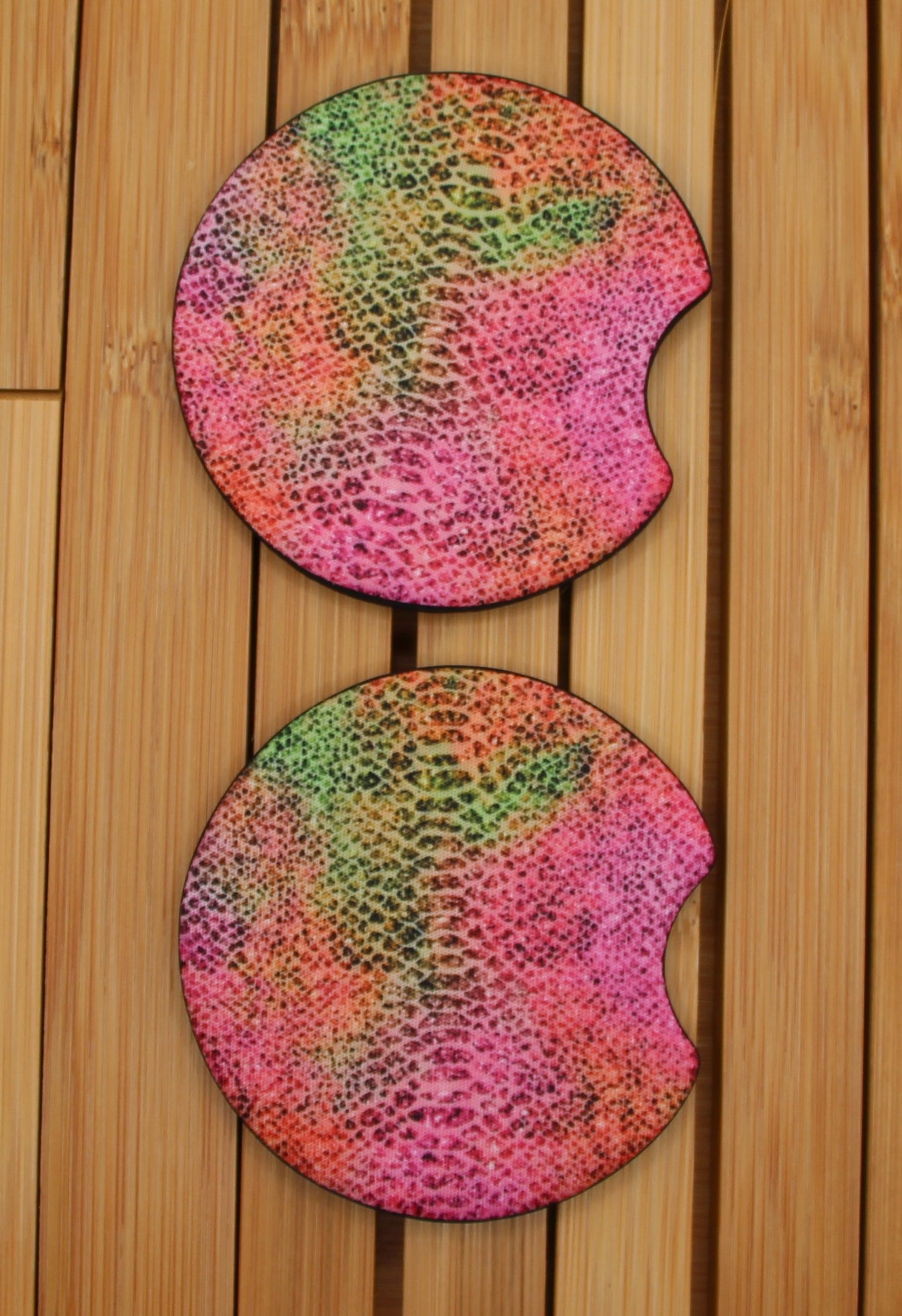 Stylish snake print car coasters in pink and green