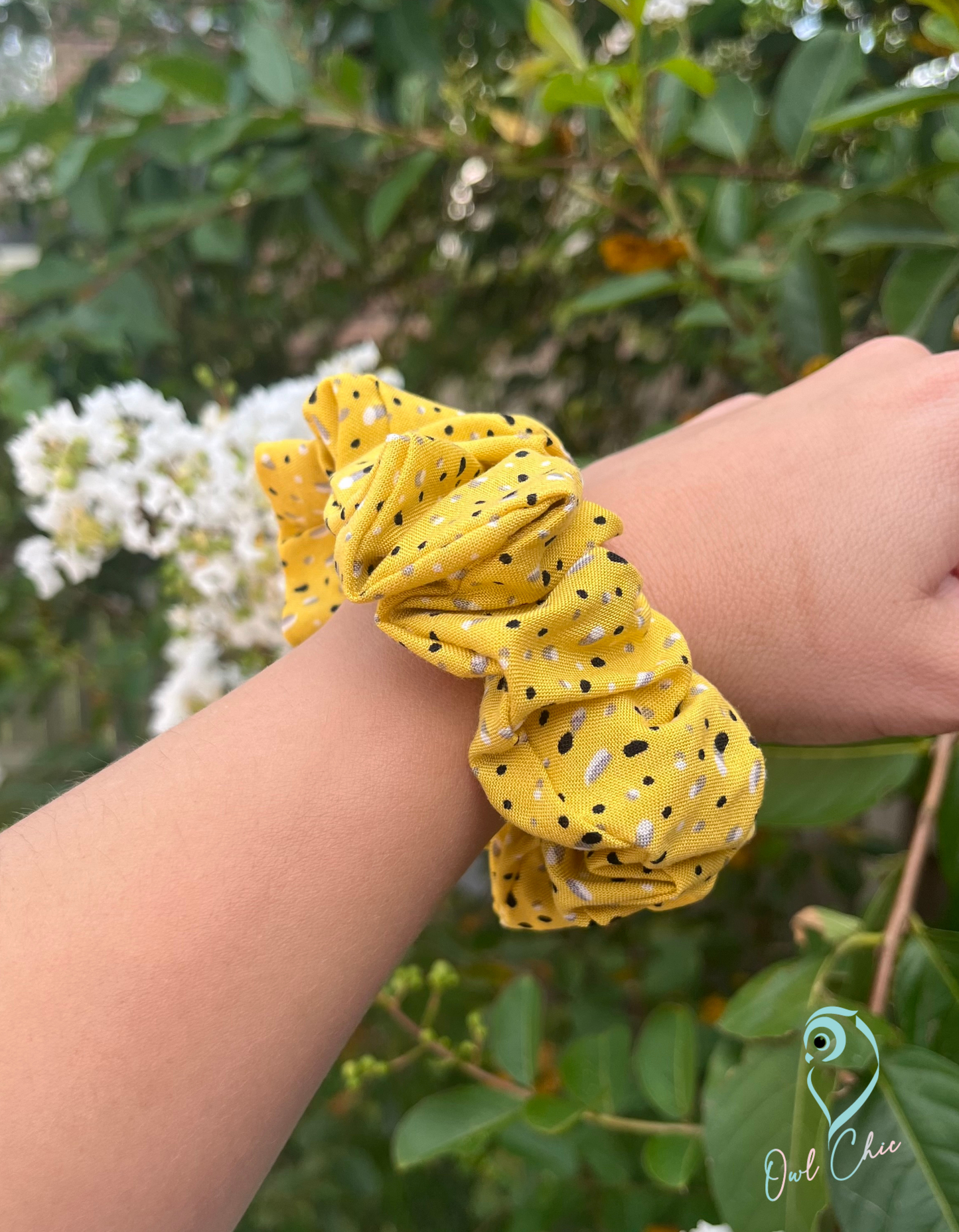 Handmade yellow rayon challis scrunchie in a dot pattern.