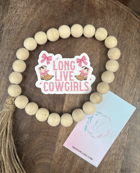 Long Live Cowgirls sticker design with pink boots and bows – a fun, feminine western graphic perfect for tumblers, laptops, or rodeo gear.