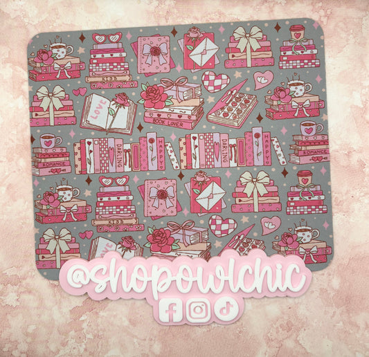 Romance book lover mouse pad with pink books, bows, hearts, and roses